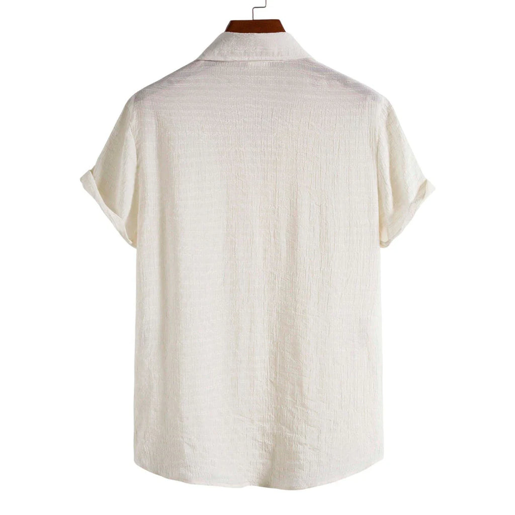 Camisa Manga Curta Torinzi Playa Off White TZ591 masculina, modelo leve e moderno, ideal para combinações elegantes com toque descontraído.