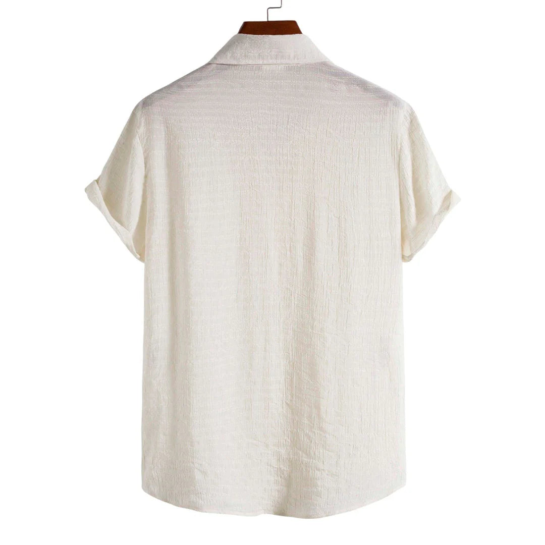 Camisa Manga Curta Torinzi Playa Off White TZ591 masculina, modelo leve e moderno, ideal para combinações elegantes com toque descontraído.